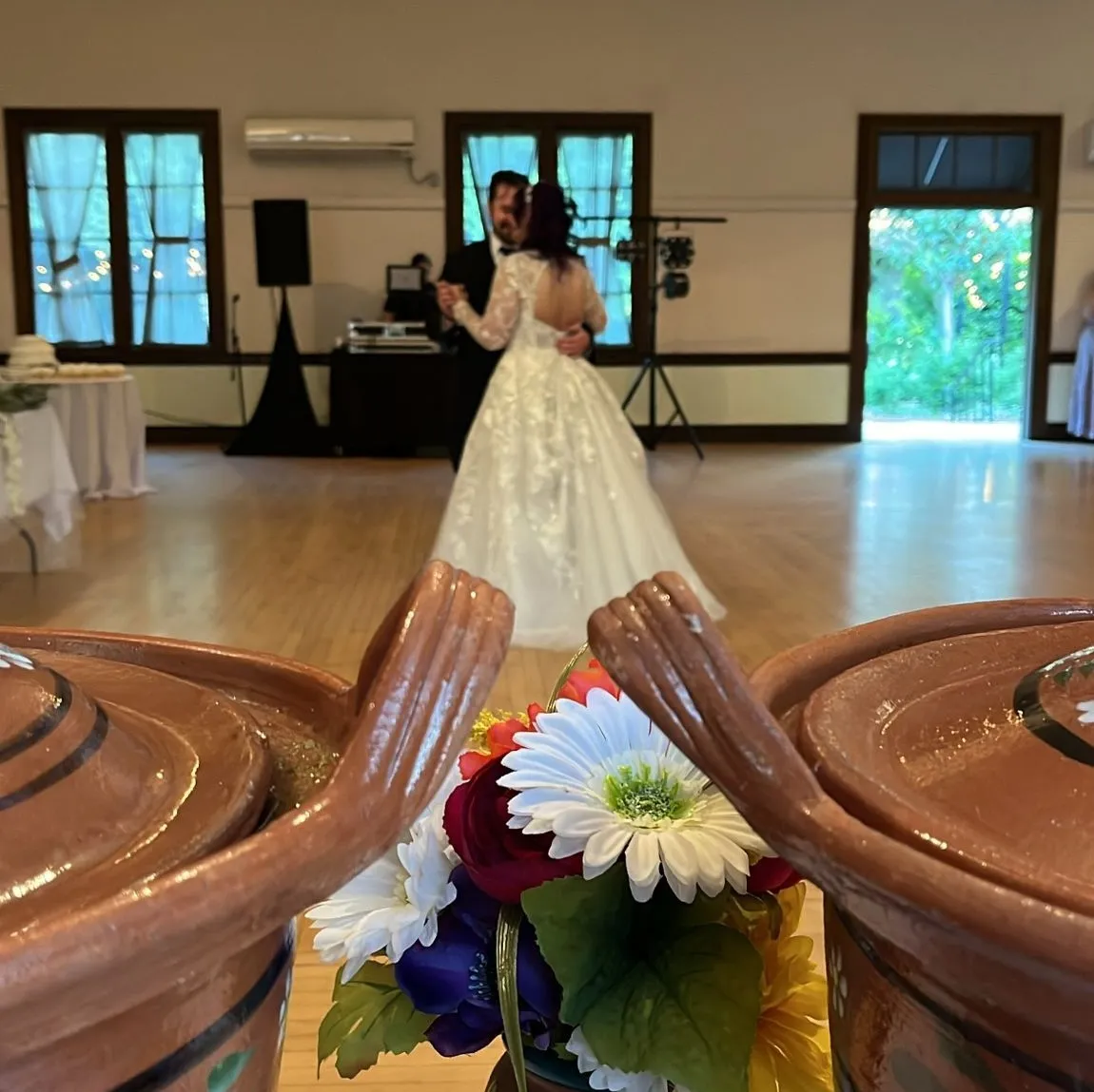 Mexican wedding buffet served in cazuelas de barro.